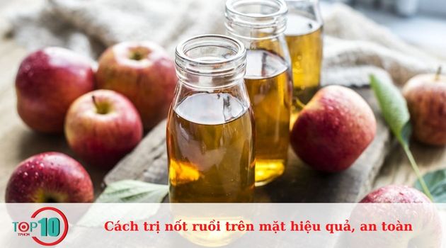 Trị nốt ruồi trên mặt bằng giấm táo