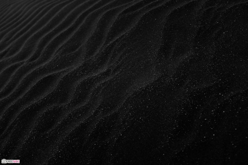 Ảnh nền cồn cát màu đen.