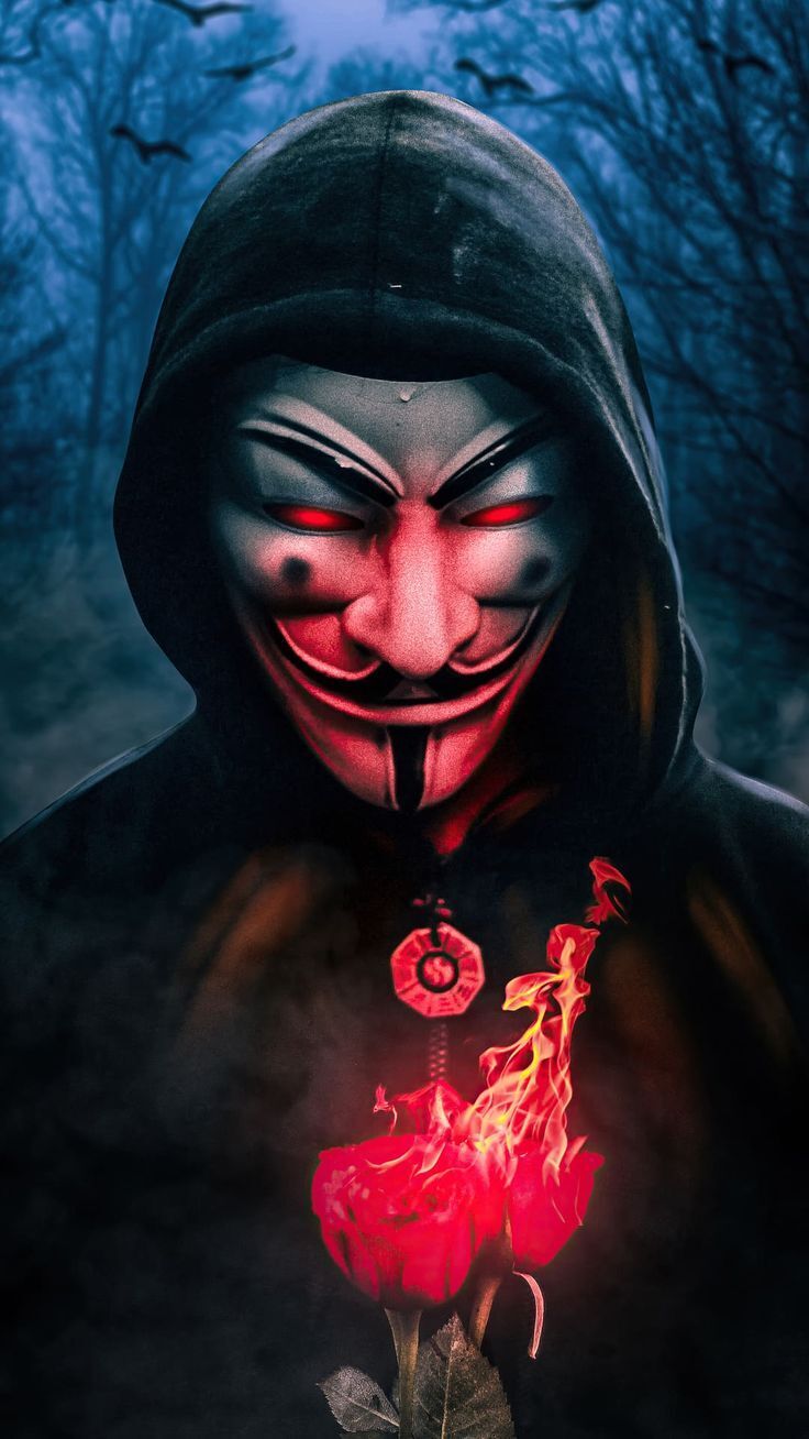 Hình ảnh hacker ngầu Anonymous đang cầm bông hoa hồng rực cháy.